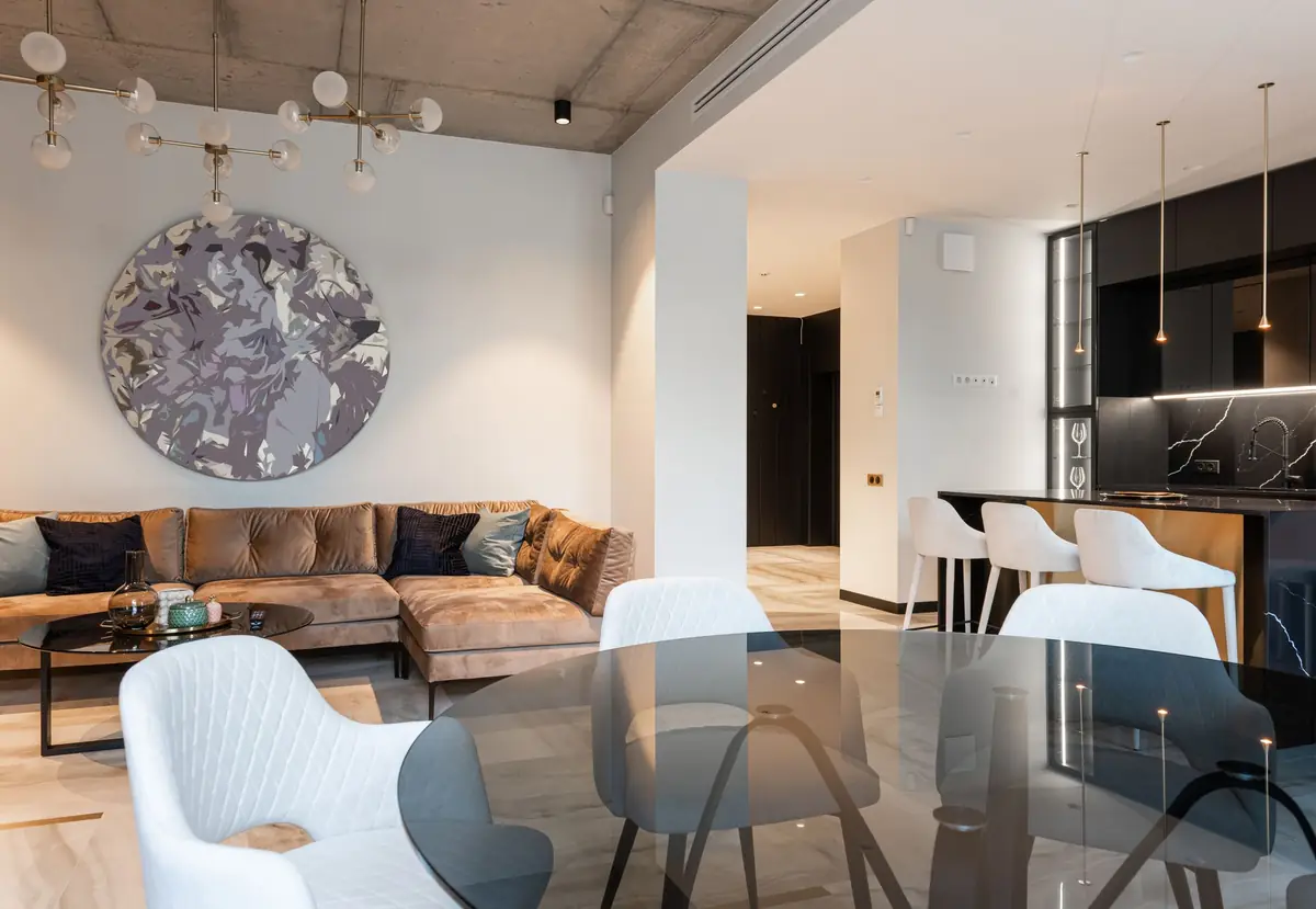 Open-plan condo living room with a kitchen island